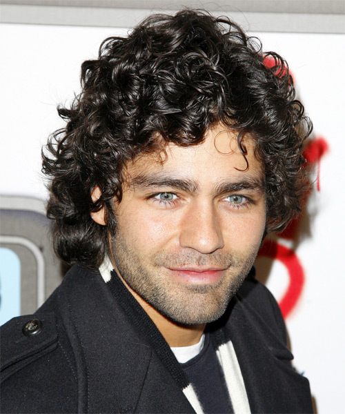 good haircuts for men with curly hair. This medium hairstyle is great