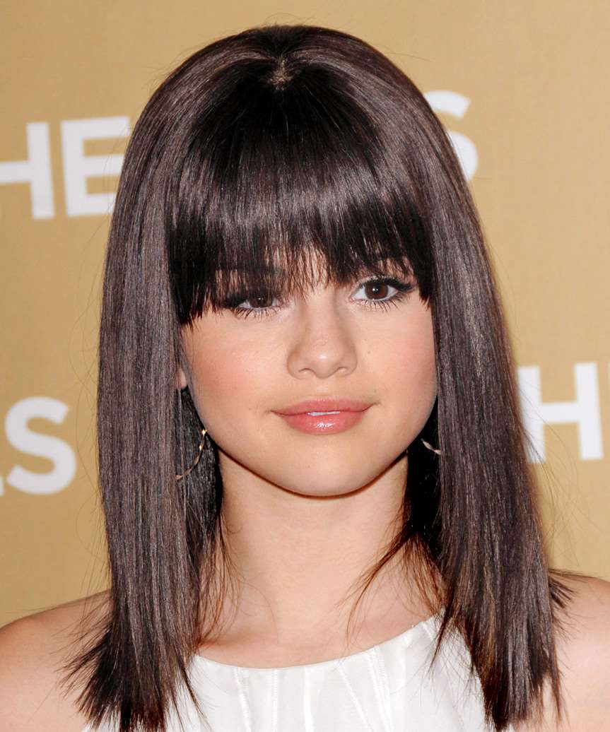 aims of Selena Gomez#39;s selena gomez with short hair and side bangs. aims of Selena Gomez#39;s