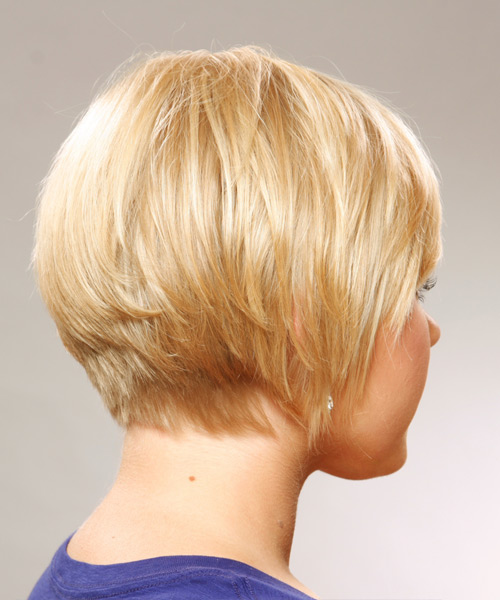 This short and sassy hairstyle is tapered into the neck to create body