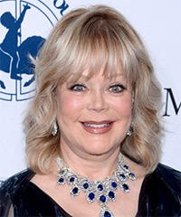 Candy Spelling Hairstyle - click to view hairstyle information