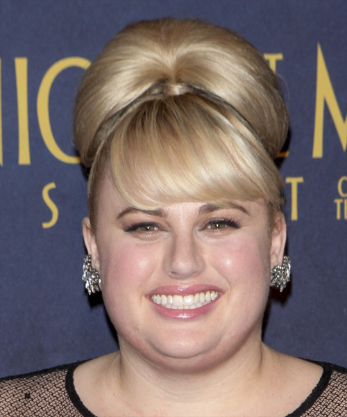 Rebel Wilson Updo Hairstyle for Round Faceshape.