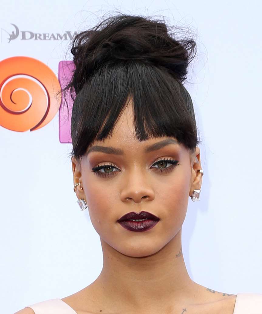 Rihanna Long Straight Updo with a high Bun and Blunt Cut Bangs