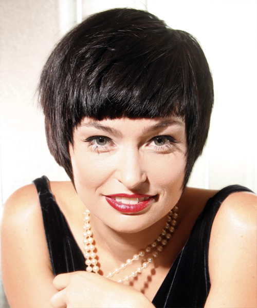 Short Black Hairstyle With Blunt Cut Bangs