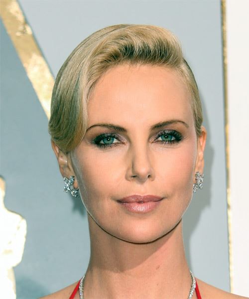 Charlize Theron Hollywood vintage look with a deep side part and waved front sectio