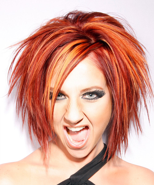 Mid-Length Bright Orange Hairstyle With Texture And Attitude