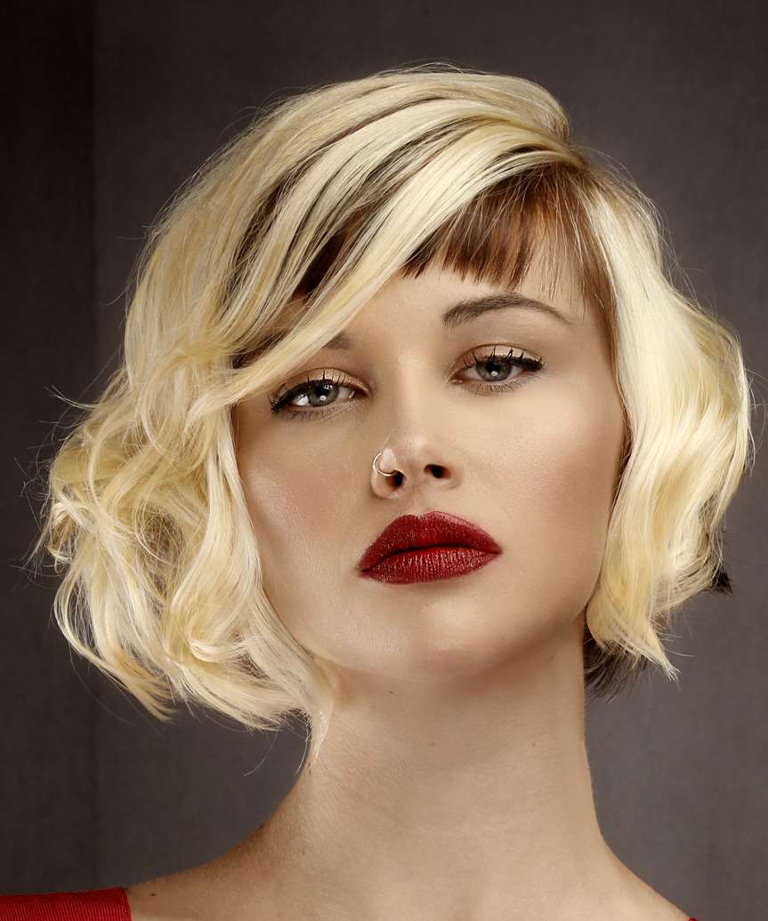 Short Wavy Bob Hairstyle with Asymmetrical Bangs and Two-Tone Highlights