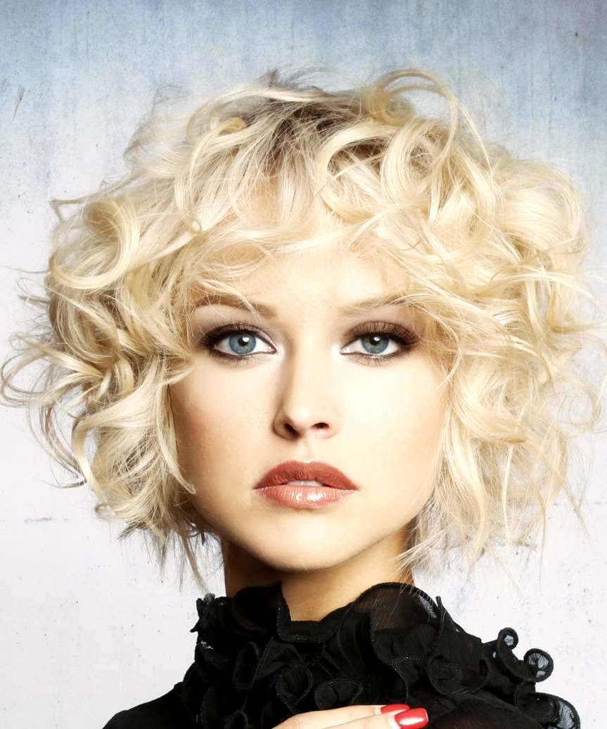 Short Curly Light Platinum Blonde Shag Hairstyle With Layered Bangs