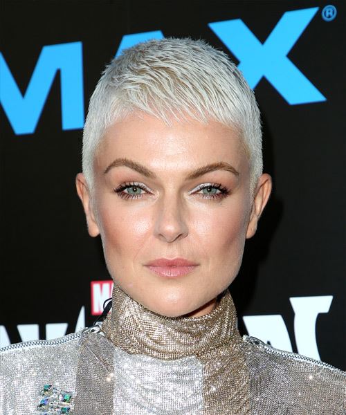 Serinda Swan Platinum Blonde Pixie Haircut with Layered Bangs