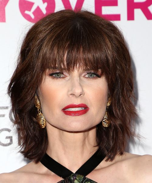 Carrie Genzel Straight    Auburn Brunette with Layered Bangs