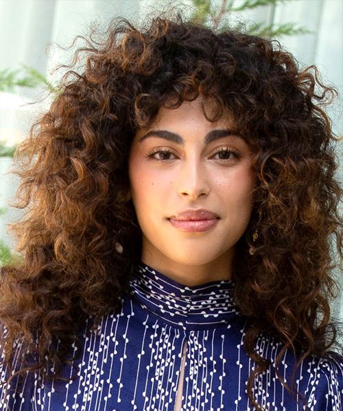 Mina El Hammani Curly    Brunette with Side Swept Bangs  and Light Brunette Highlights
