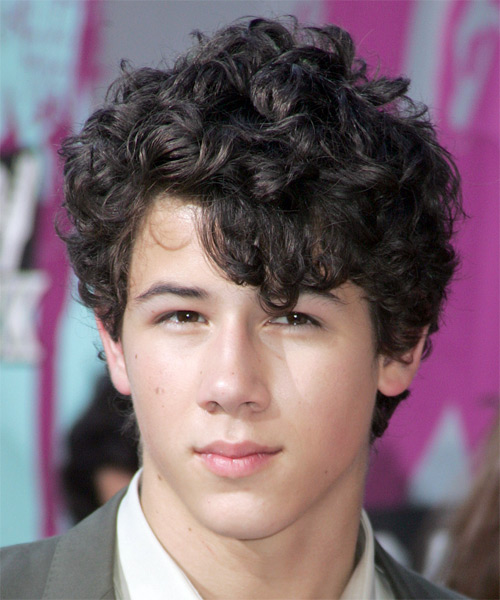 Nick Jonas Short Curly Casual Dark Brunette Hairstyle