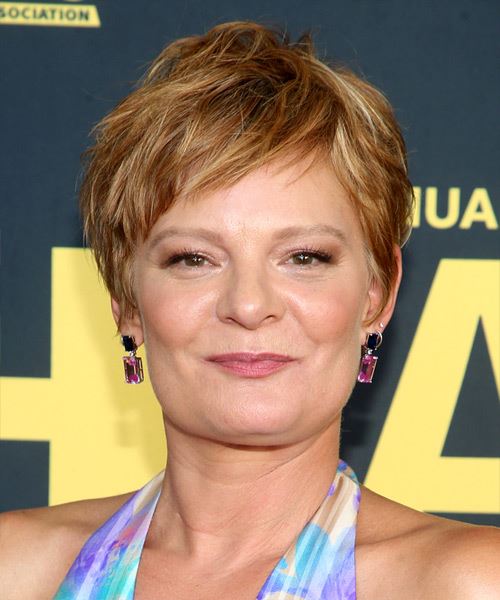 Martha Plimpton     Light Red Pixie  Haircut with Side Swept Bangs  and Light Blonde Highlights