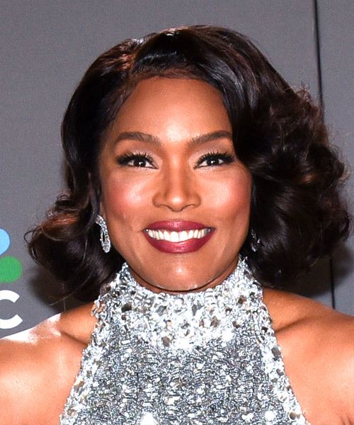 Angela Bassett Luscious Shoulder-Length Hairstyle With Waves