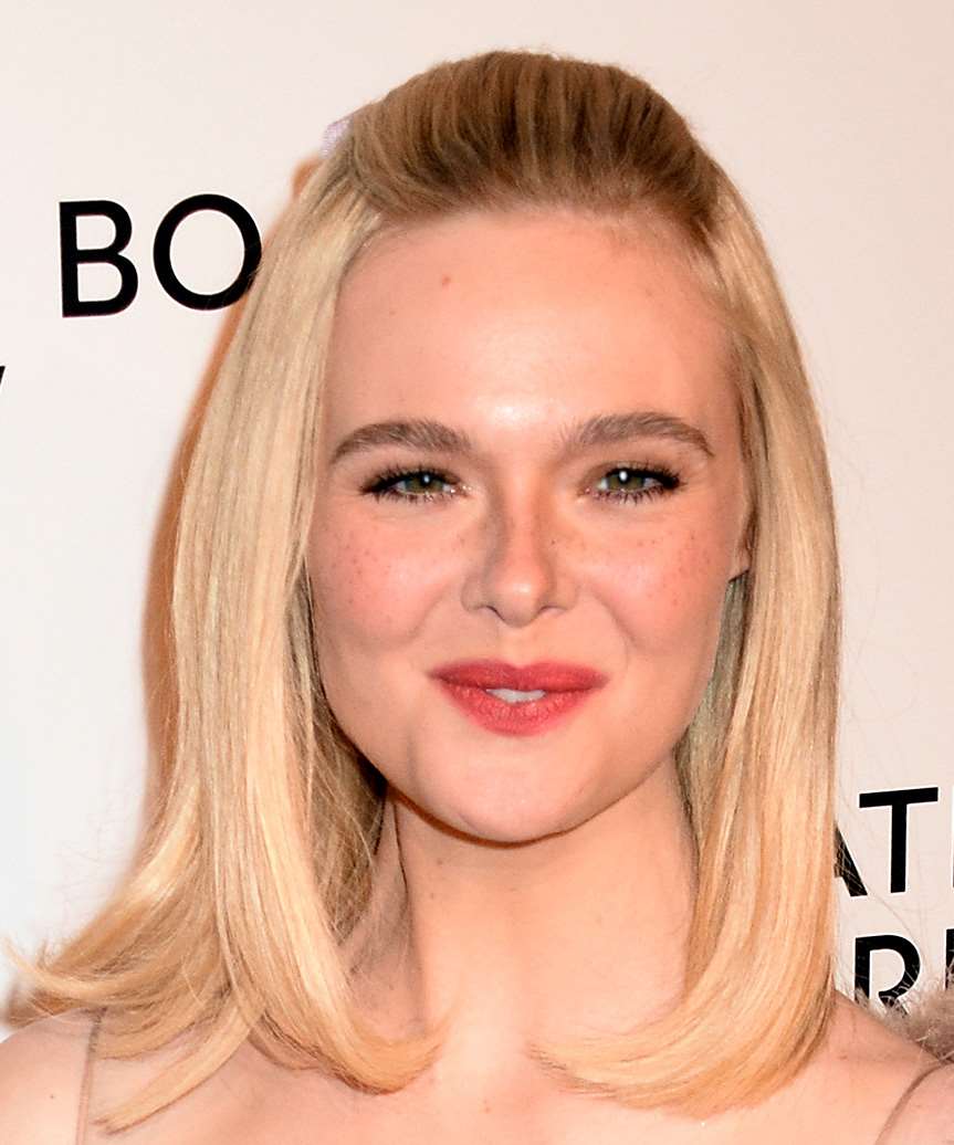 Elle Fanning Classic Hairstyle With Pinned-Back Bangs