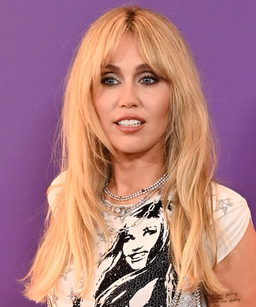 Miley Cyrus Long Easy-Going Blonde Hairstyle