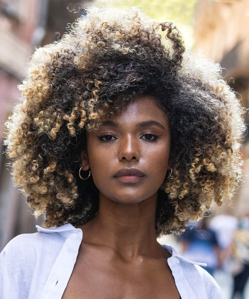 Bold Medium-Length Hairstyle With Defined Curls