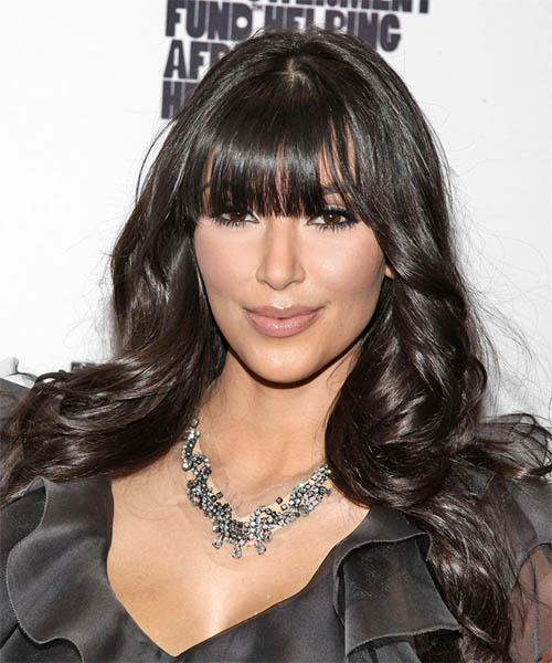 Kim Kardashian Long Wavy Casual Hairstyle with Blunt Cut Bangs