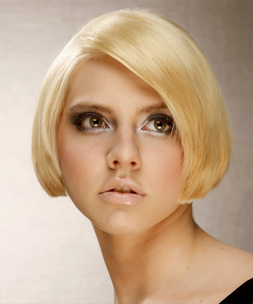 Short straight bold bob hairstyle for a Heart Face Shape