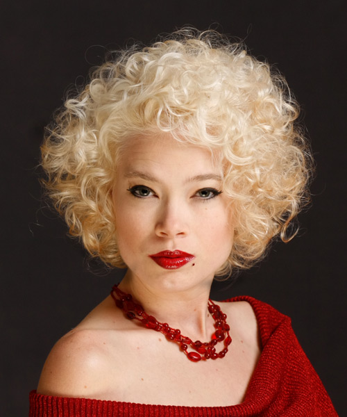 Short Face-Framing Platinum Hairstyle With Curls