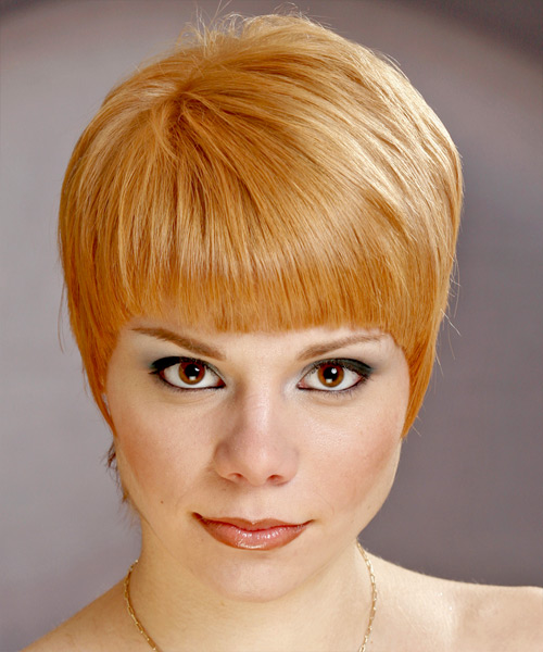Softly Layered Pixie Haircut With Thick Bangs