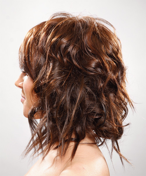 Wavy Brown Hairstyle With Extra Body - side on view