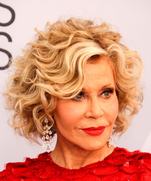 Jane Fonda Medium Curly    Blonde Bob  Haircut with Side Swept Bangs  - Side on View
