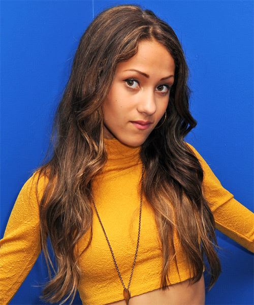 Skylar Stecker Long Wavy   Black    Hairstyle   with Light Brunette Highlights - Side on View
