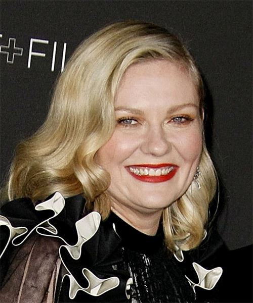 Kirsten Dunst Medium Wavy    Blonde   with Side Swept Bangs  and Light Blonde Highlights - side on view