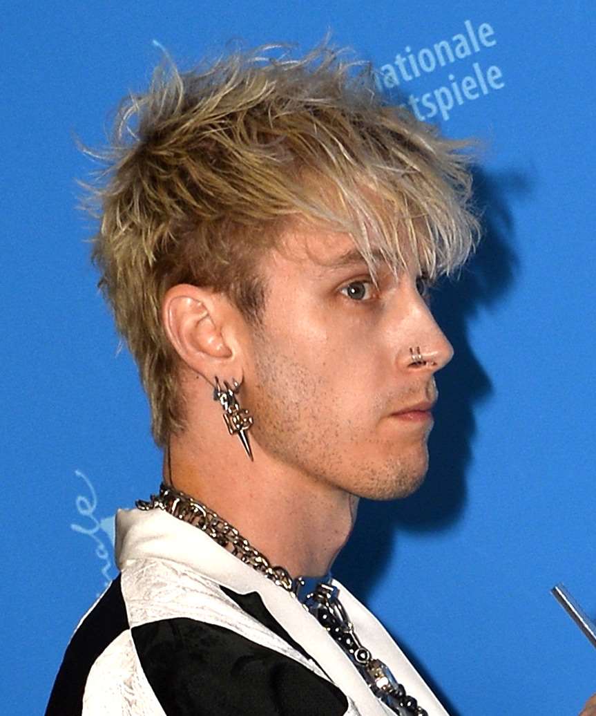 Machine Gun Kelly Short Wavy    Blonde   Hairstyle with Layered Bangs - view from the side