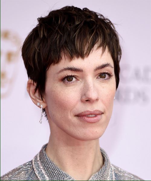 Rebecca Hall Layered  Black  Pixie    with  Blonde Highlights - side on view