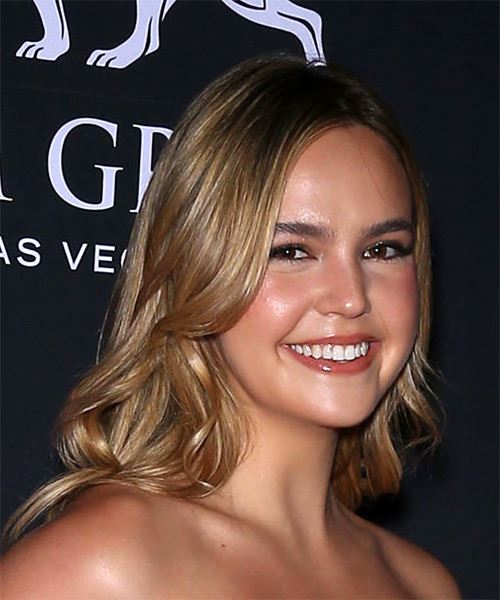 Bailee Madison Long Wavy    Brunette     with  Blonde Highlights - side on view