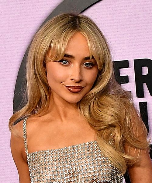 Sabrina Carpenter Long Voluminous Hairstyle With Curtain Bangs - side on view