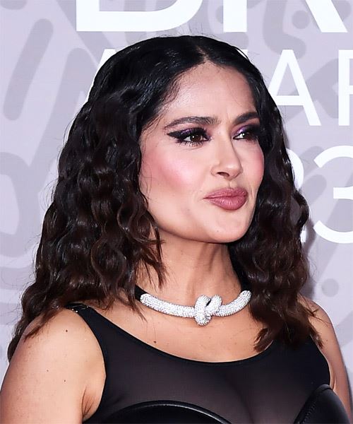Salma Hayek Shoulder-Length Crimped Hairstyle With Curls - side on view