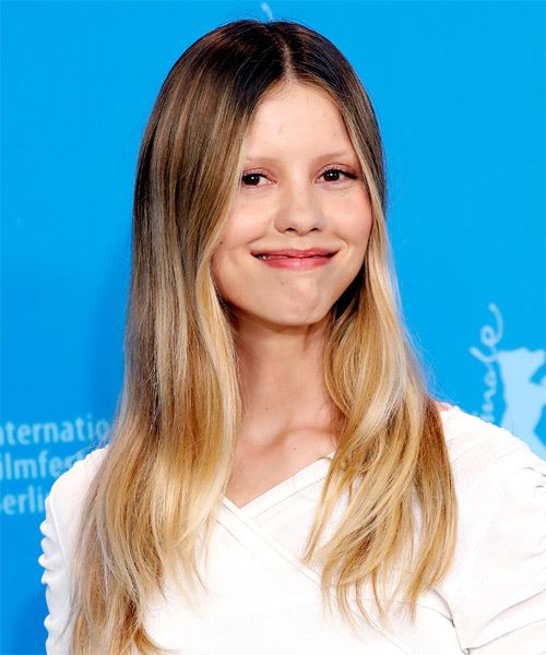 Mia Goth Long Blonde Hairstyle - side on view
