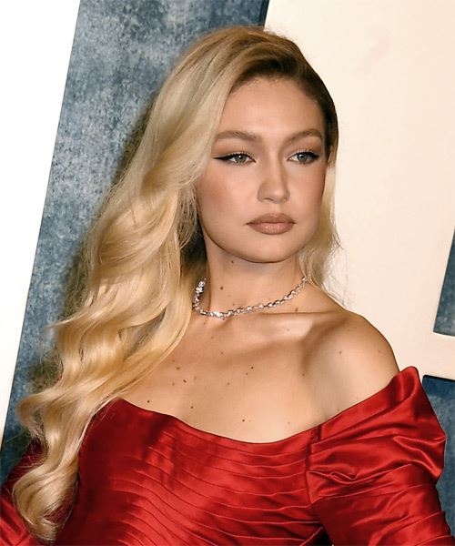 Gigi Hadid Long Blonde Hairstyle With Soft Waves - side on view