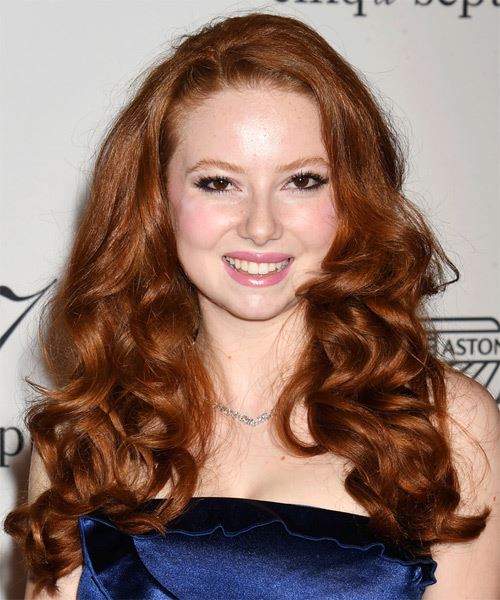 Francesca Capaldi Long Copper Hairstyle With Curls - side on view