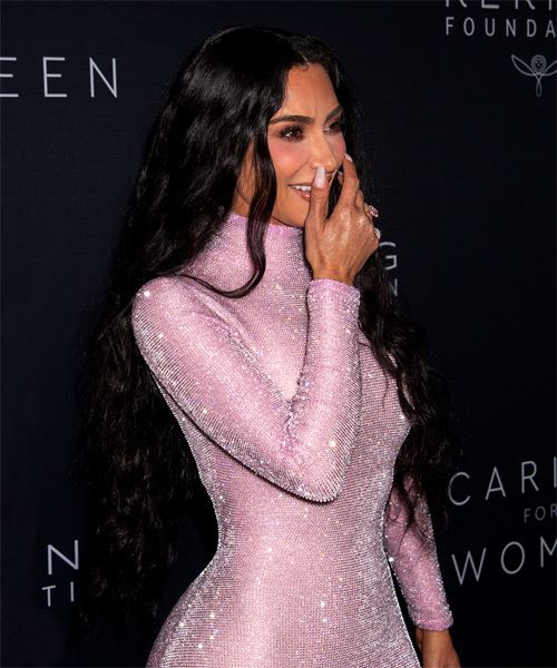 Kim Kardashian Long Black Voluminous Hairstyle With Subtle Waves - side on view