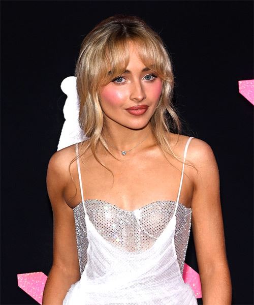 Sabrina Carpenter Blonde Hairstyle With Waterfall Bangs - side on view