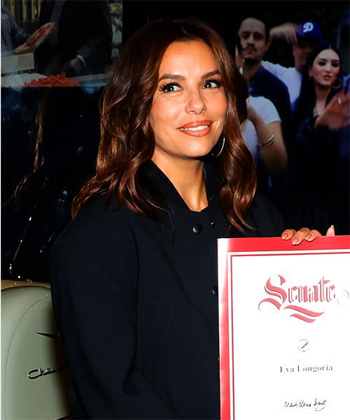 Eva Longoria Hairstyle With Tight Curls  - side on view