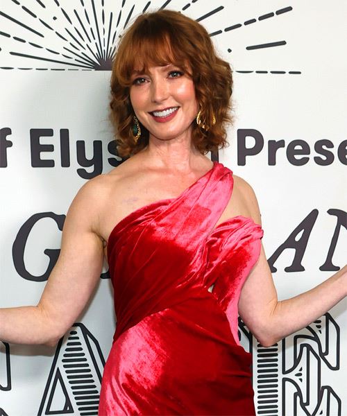 Alicia Witt Shoulder-Length Hairstyle With Classic Fringe - side on view