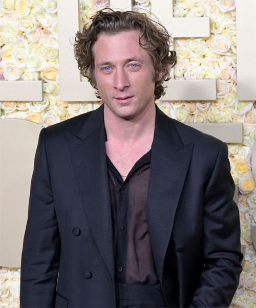 Jeremy Allen White Hairstyle With Curls - side on view