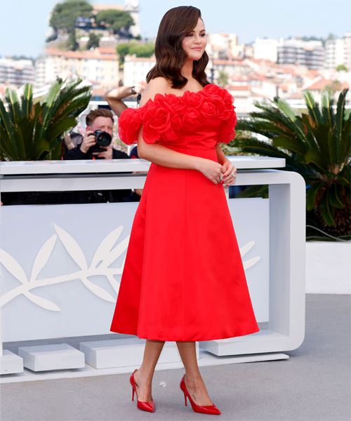 Selena Gomez Hairstyle With Bold Curls - 2024 Cannes Film Festival - side on view