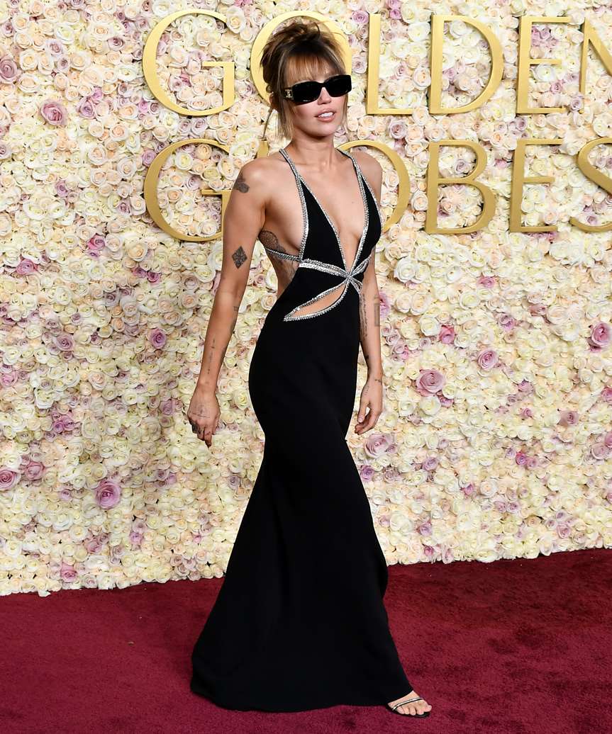 Miley Cyrus Updo With Classic Bangs - Golden Globe Awards 2025 - view from the side
