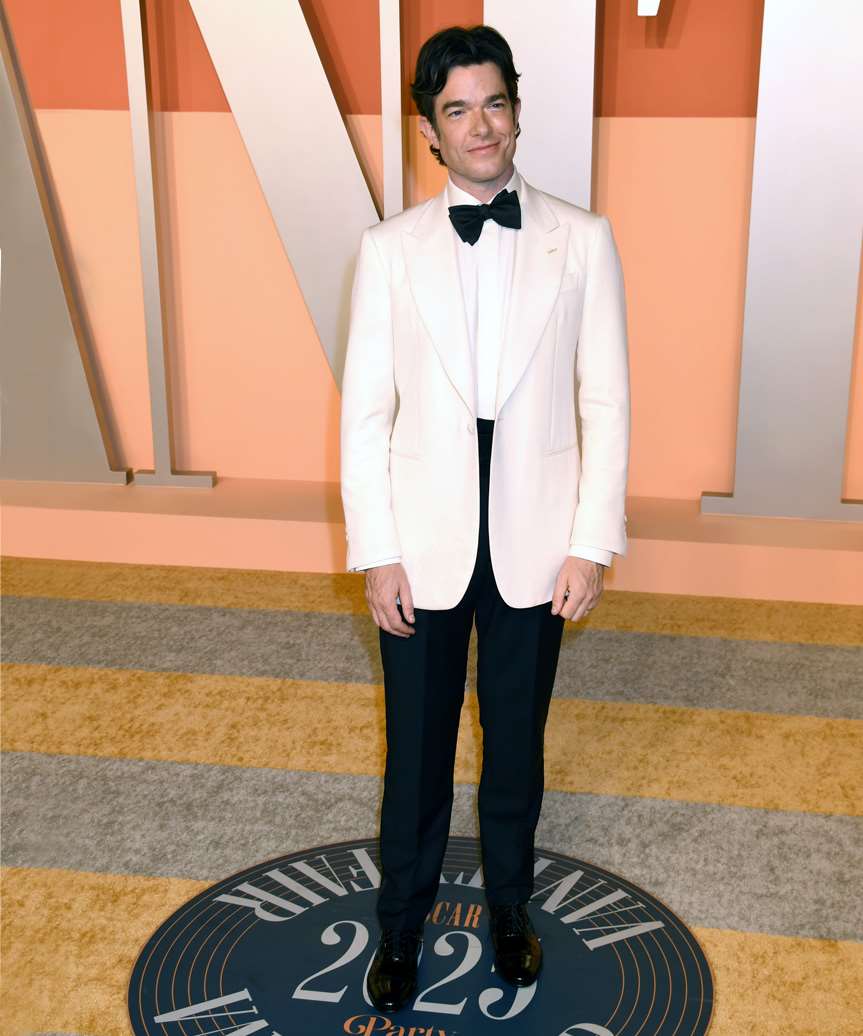 John Mulaney Hairstyle With Gentle Waves - view from the side