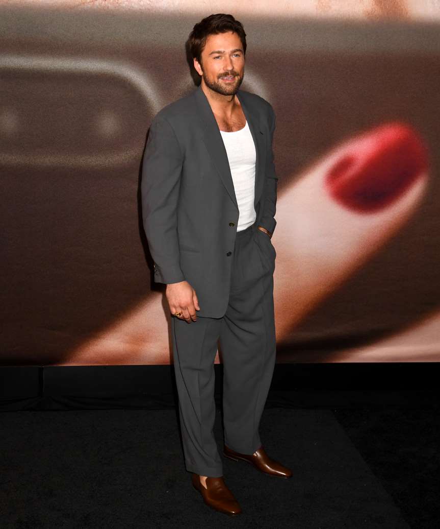 Brandon Sklenar Short Hairstyle With natural Waves - view from the side