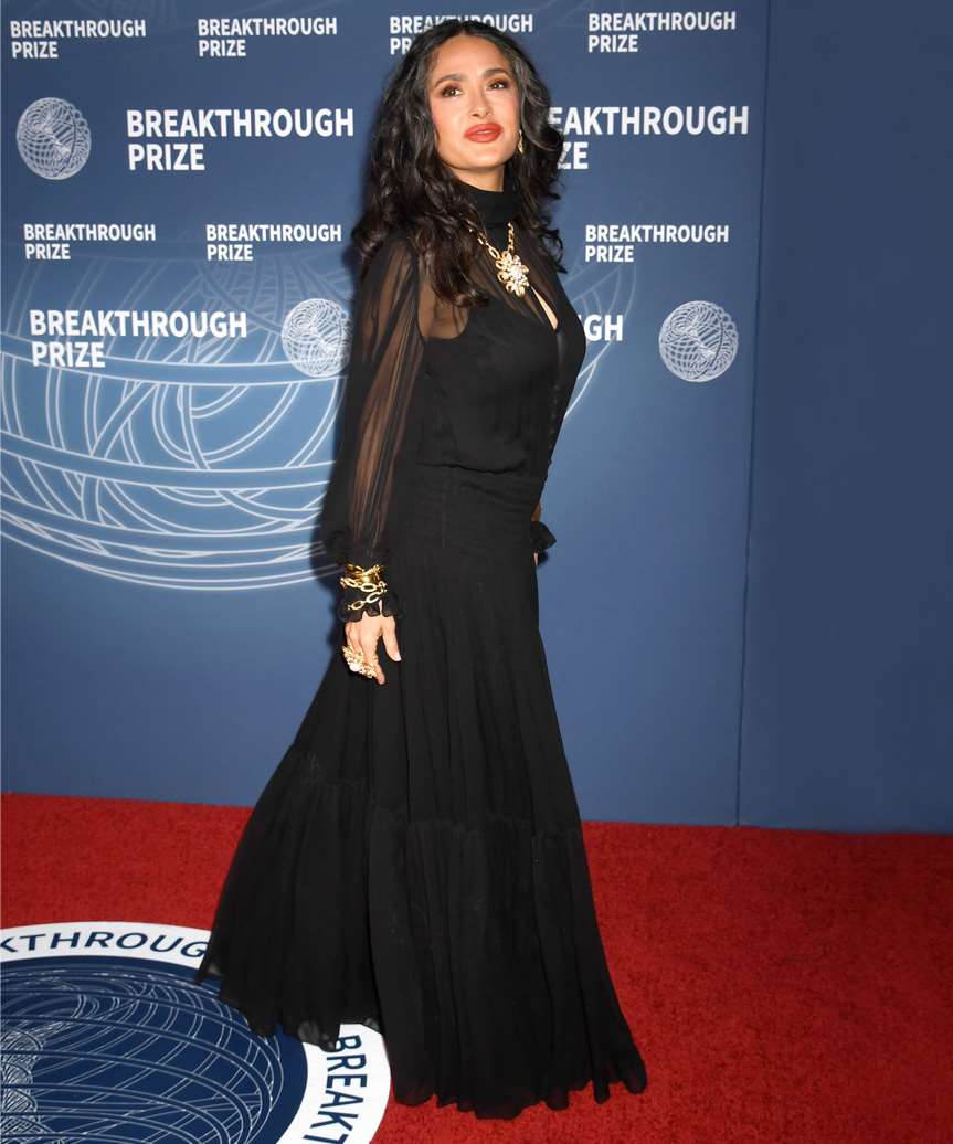 Salma Hayek Curly Hairstyle With Grey Highlights - view from the side