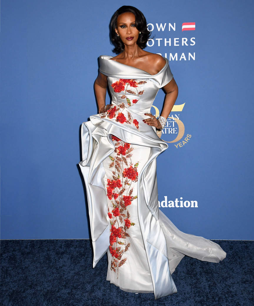 Iman Medium-Length Hairstyle With Mid-End Curls - view from the side