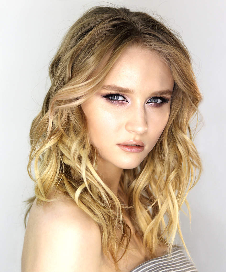 Medium-Length Hairstyle With Romantic Curls  - view from the side