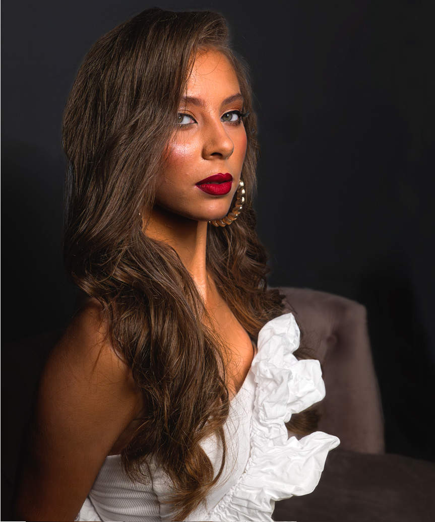 Long Glossy Hairstyle With Large Bold Curls - view from the side