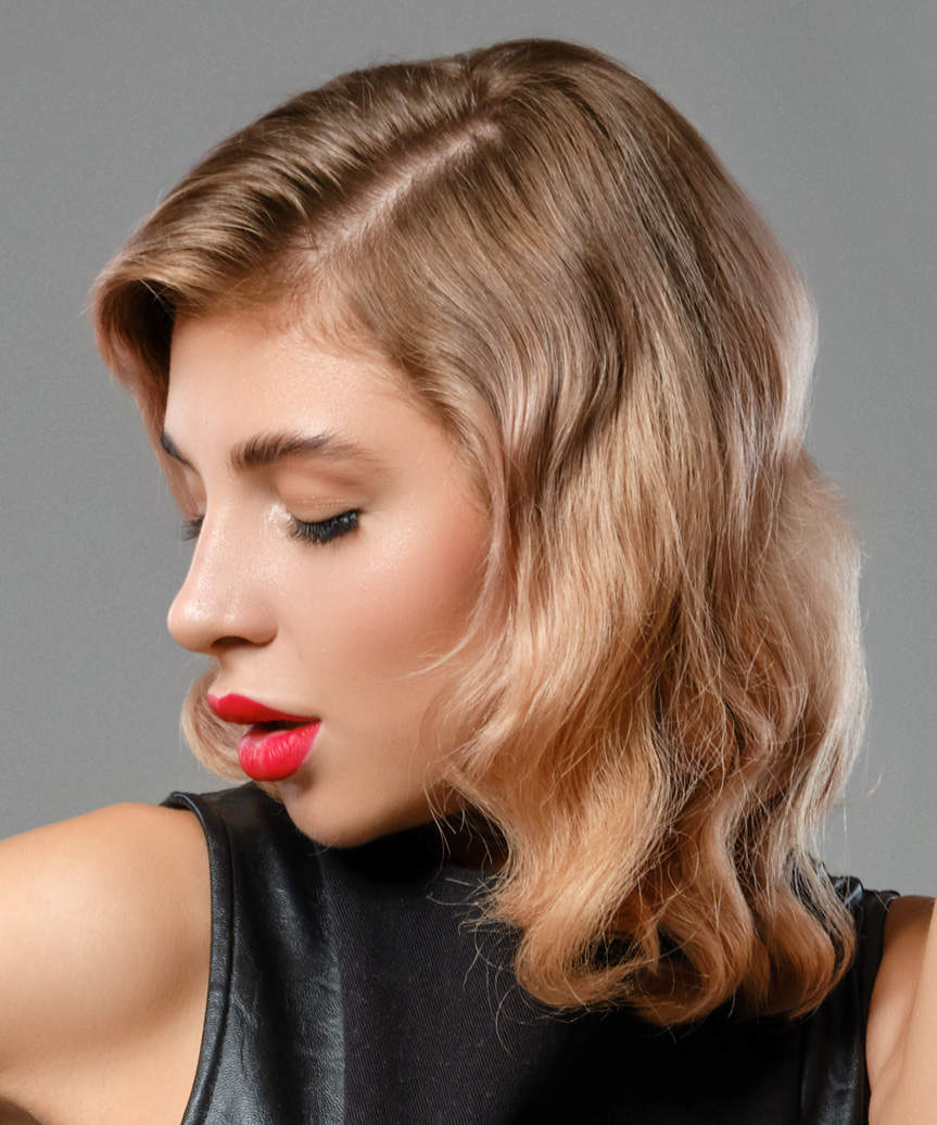 Medium-Length Side-Swept Hairstyle With Mid-End Curls - view from the side